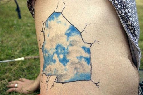 Blue Ink Optical Illusion Tattoo On Side Rib